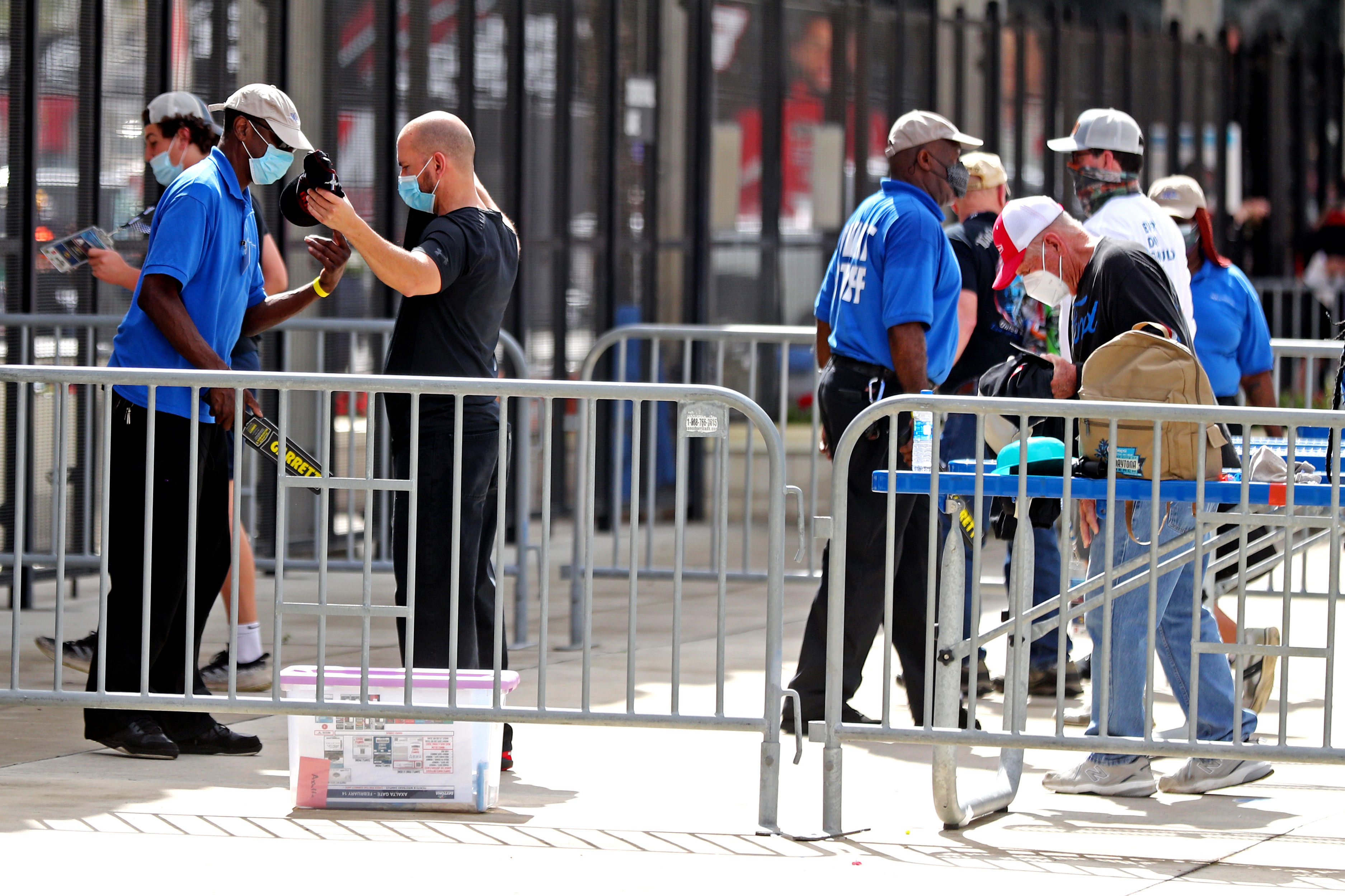 Fans go through a security check before the NASCAR Daytona 500. Source: Imagn